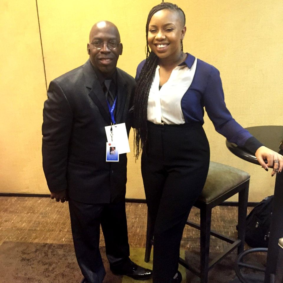 Doc Lewis with a friend at a conference